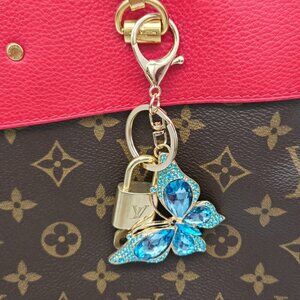 Authentic Louis Vuitton Lock & Key with unbranded Butterfly Bagcharm, Keycharm